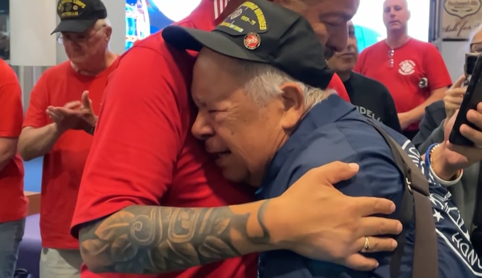 Mid-Michigan Honor Flight Veteran cries as he is welcomed home.