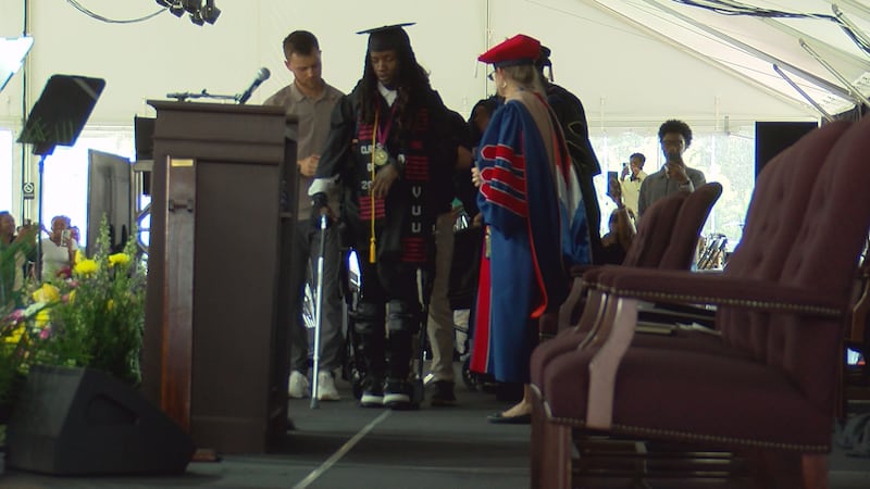 VUU graduate Jaiden Picot walks across the stage