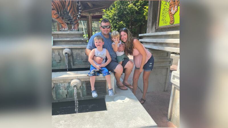 Andrew Knight, Lacey Tustin and their children.