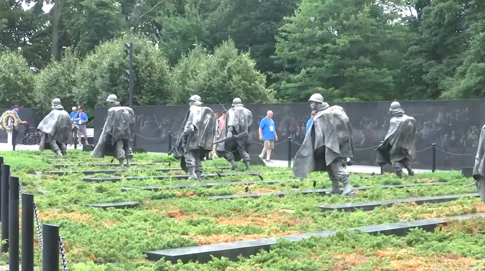 Veterans walking and remembering history.
