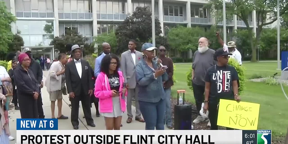 Protesters gather outside Flint City Hall in response to recent police(00)