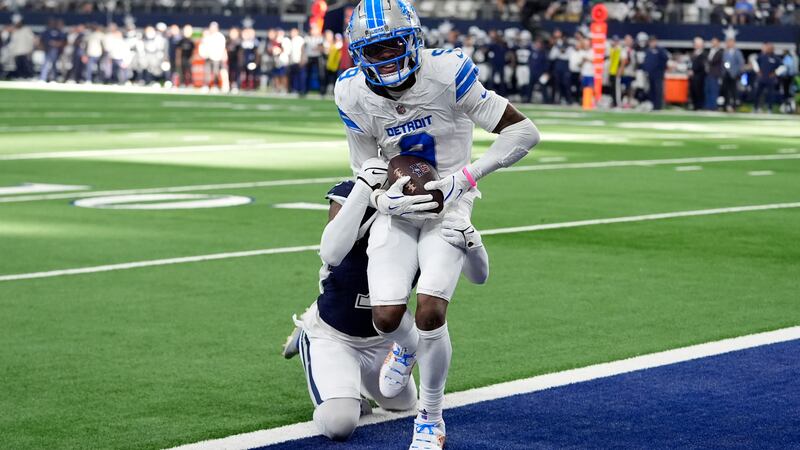 Detroit Lions wide receiver Jameson Williams (9) catches a touchdown pass as Dallas Cowboys...