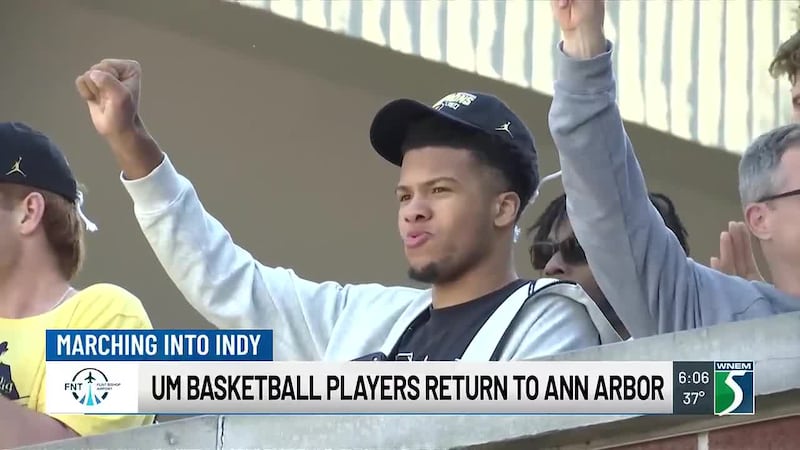 Players return to Ann Arbor after National Championship win #sponsored by Flint Bishop Airport