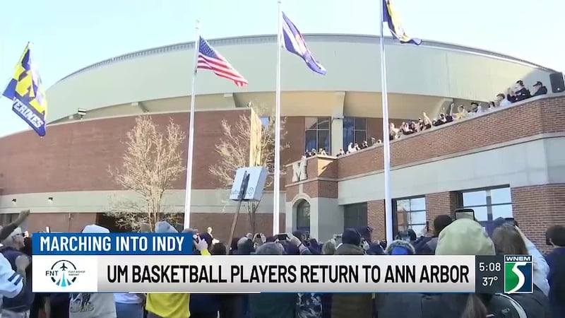 Players return to Ann Arbor after National Championship win #sponsored by Flint Bishop Airport